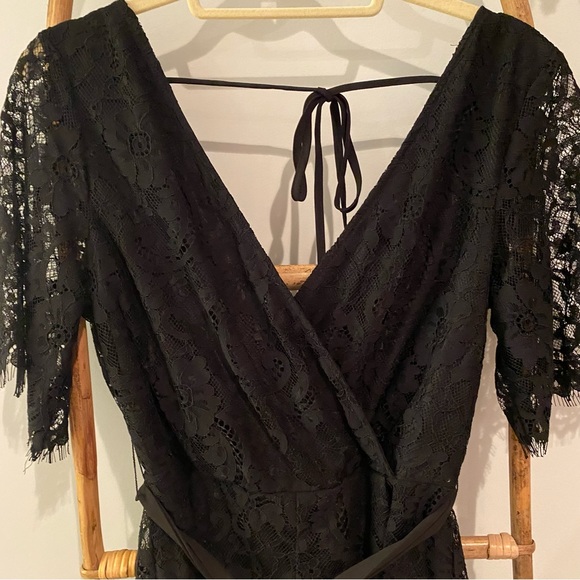 Francesca’s new black lace short sleeve romper size medium - Picture 2 of 5
